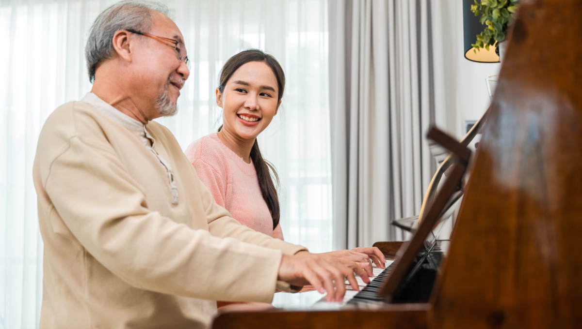 Young woman teaching piano for senior man teaching 2025 03 06 02 58 50 utc