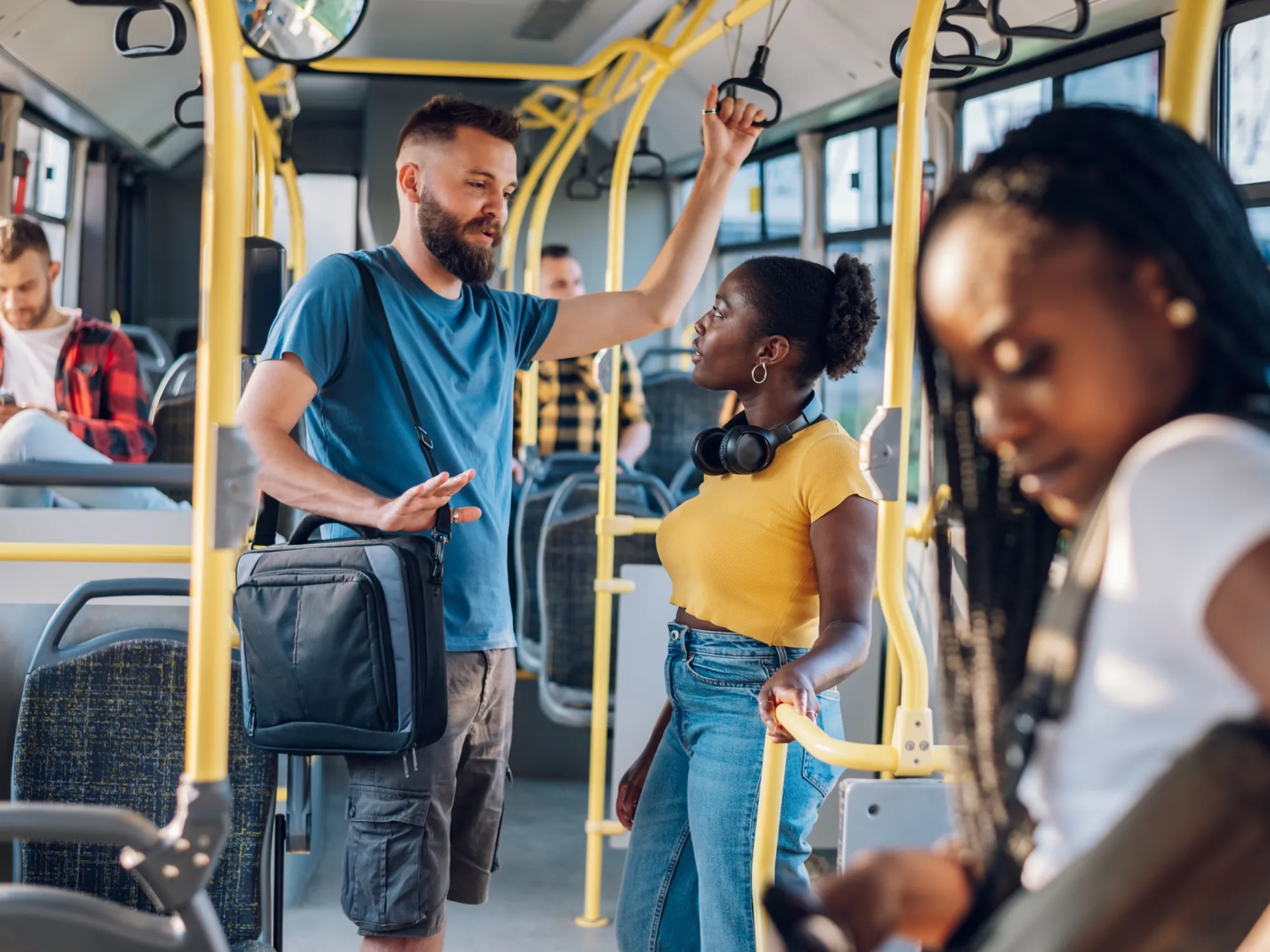 Multiracial friends talking while riding a bus in 2025 04 01 13 06 11 utc